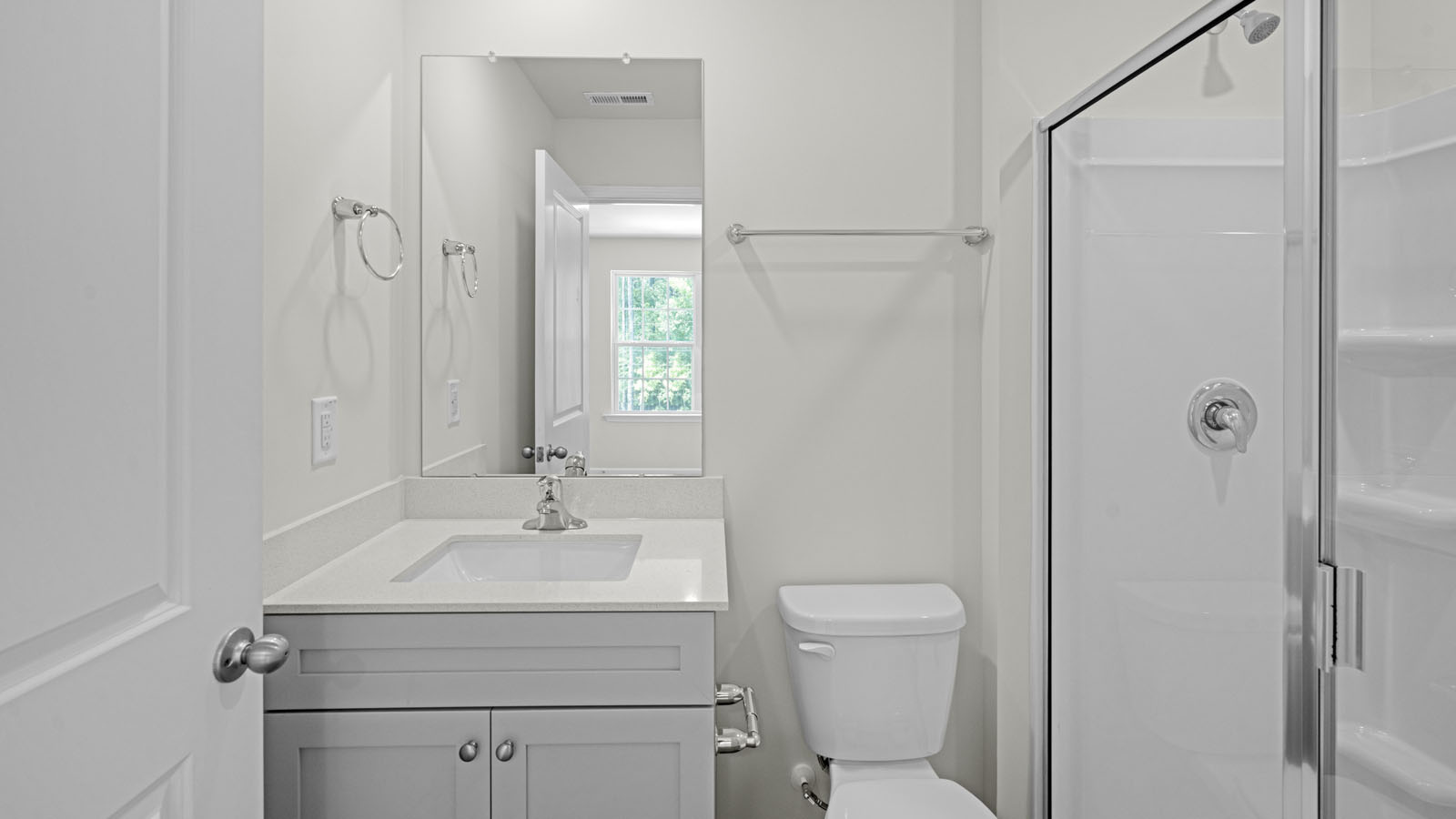 Bathroom with white cabinets