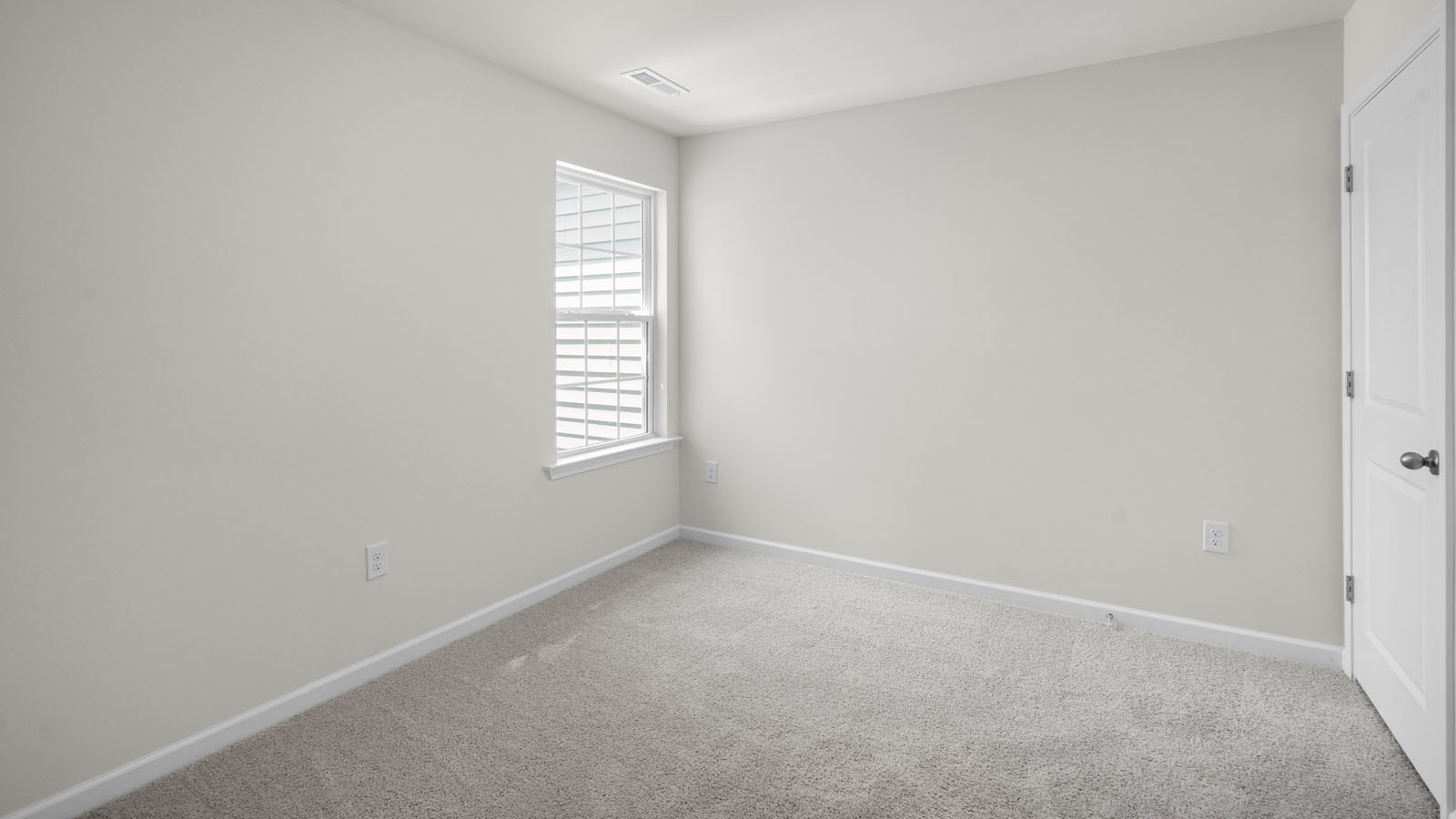 Bedroom with carpet