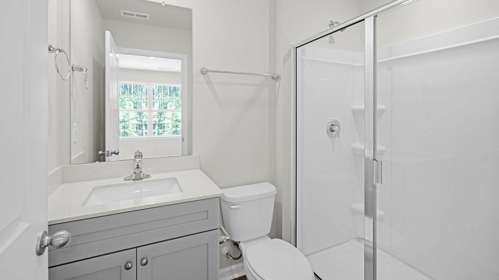 Bathroom with white cabinets
