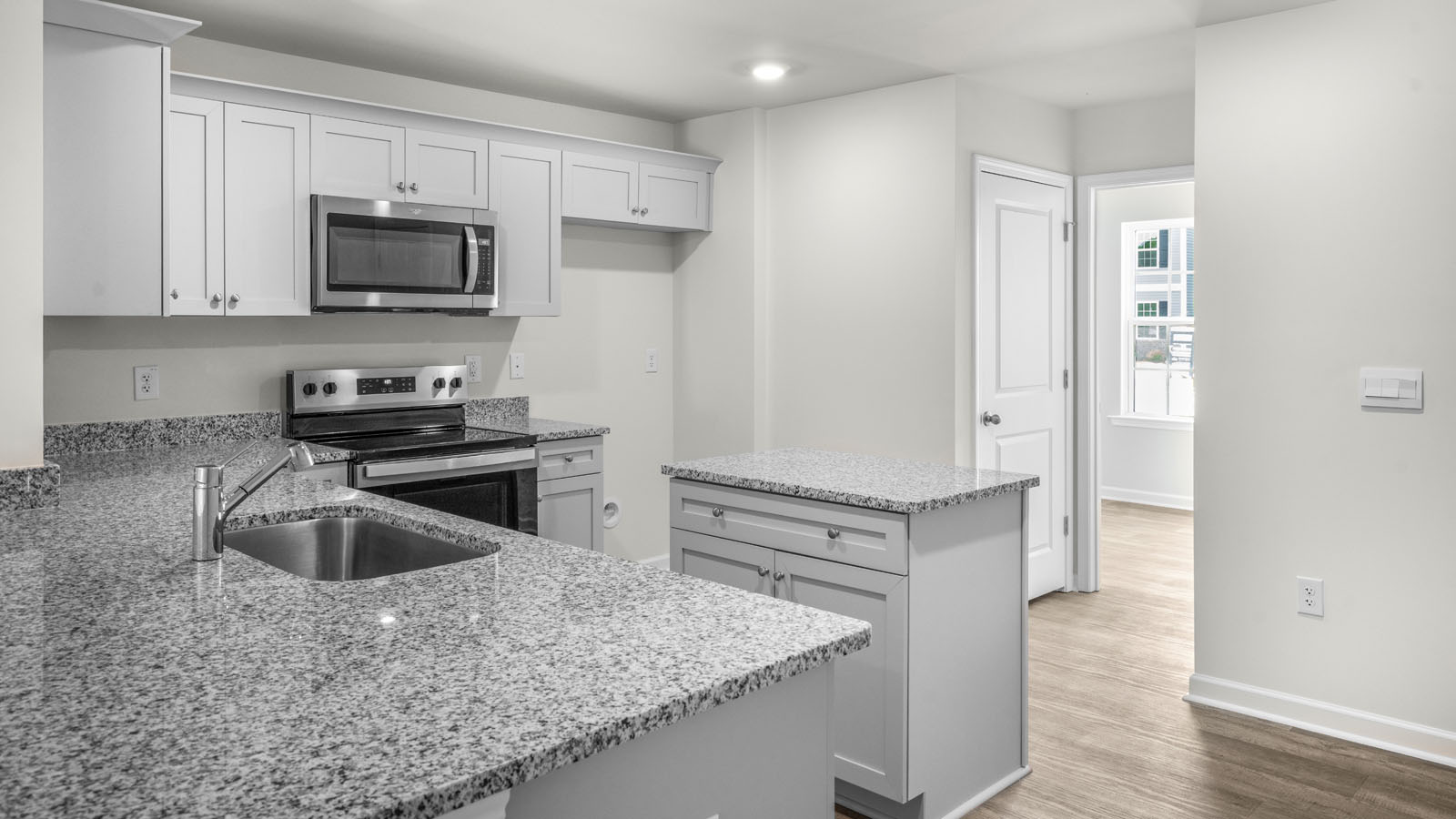 Kitchen with white cabinets