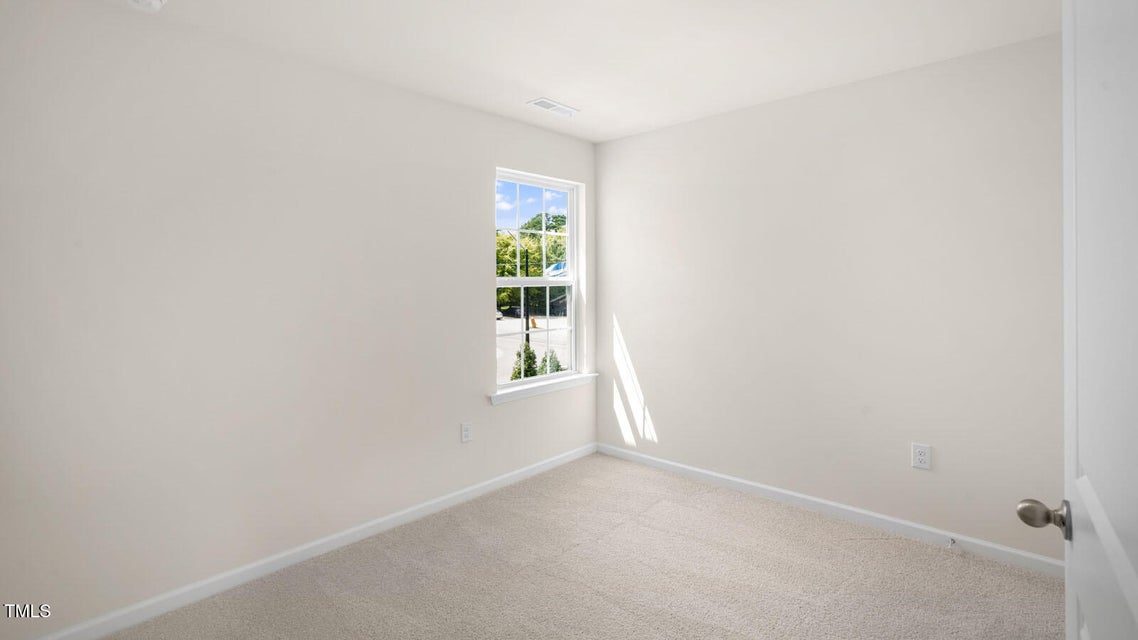 Bedroom with carpet flooring