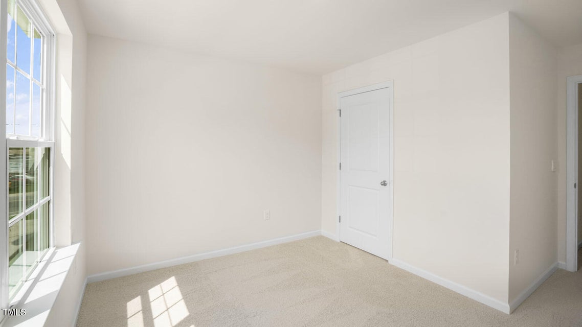 Bedroom with carpet flooring