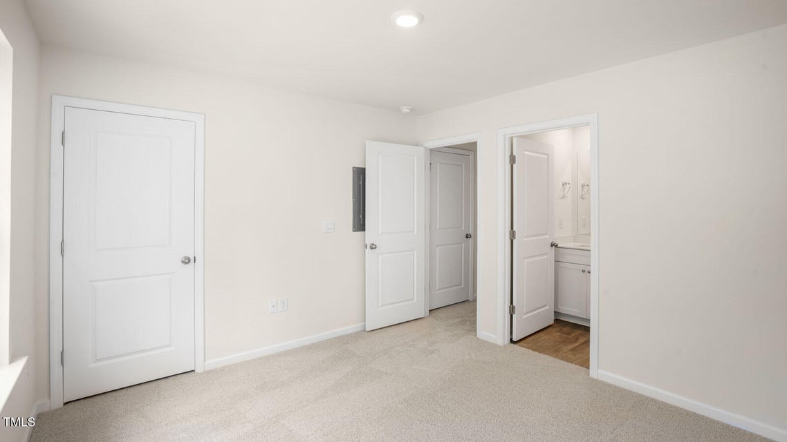 Bedroom with carpet flooring
