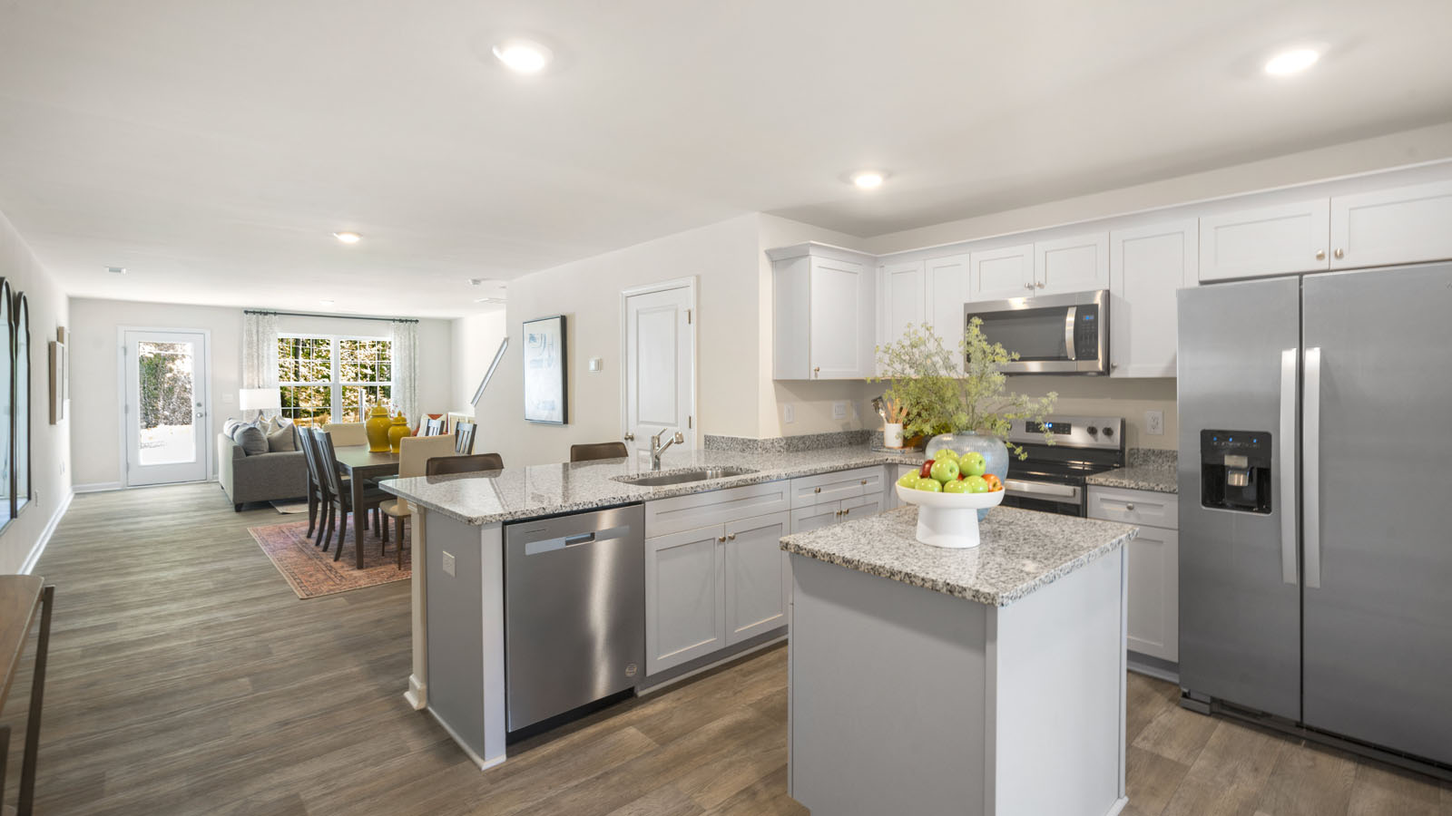 kitchen with white cabinets and granite countertops