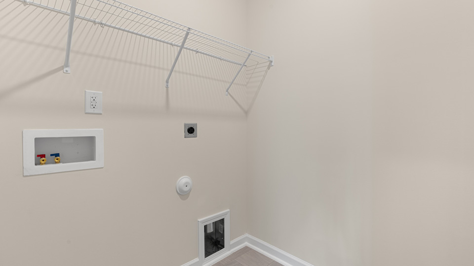laundry room with wire shelving