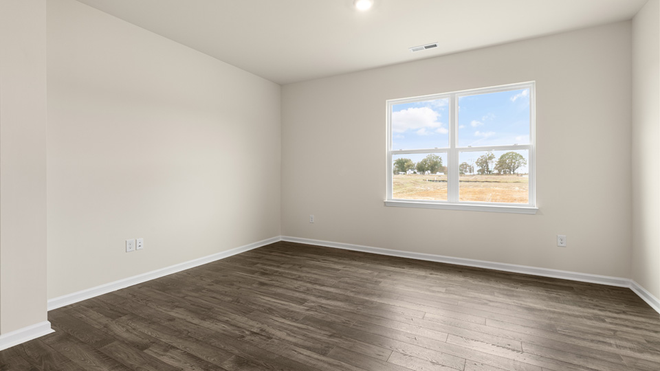 open concept living space with large windows