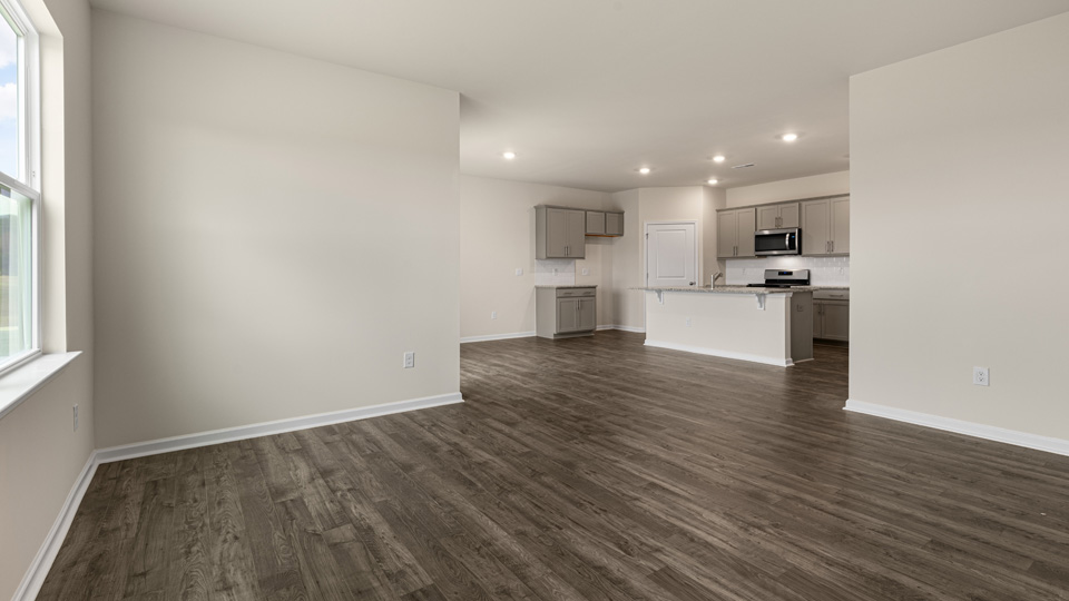 open concept living space with large windows