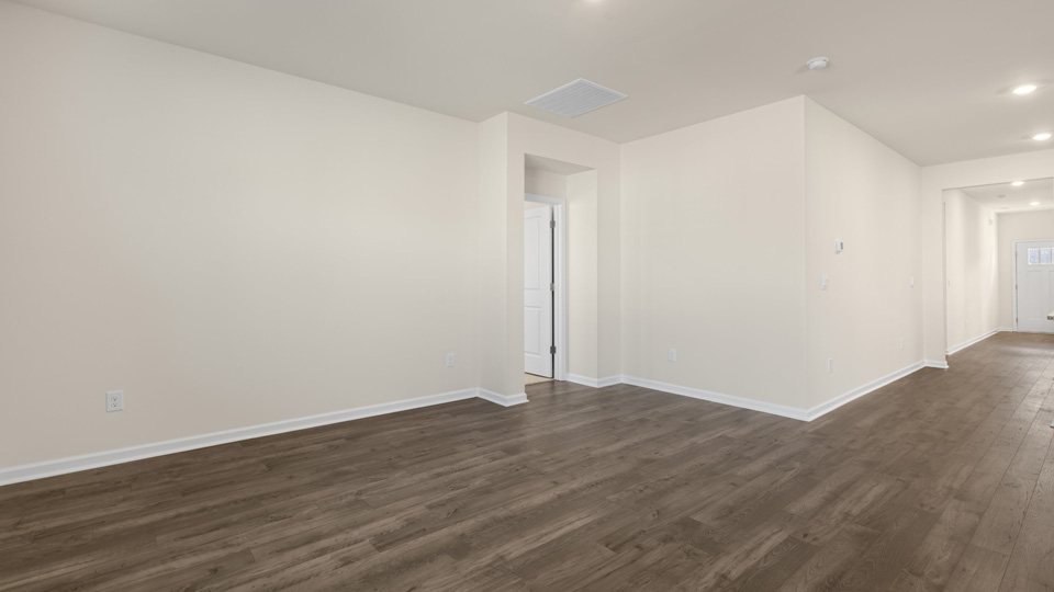 LIVING ROOM AND FRONT ENTRYWAY