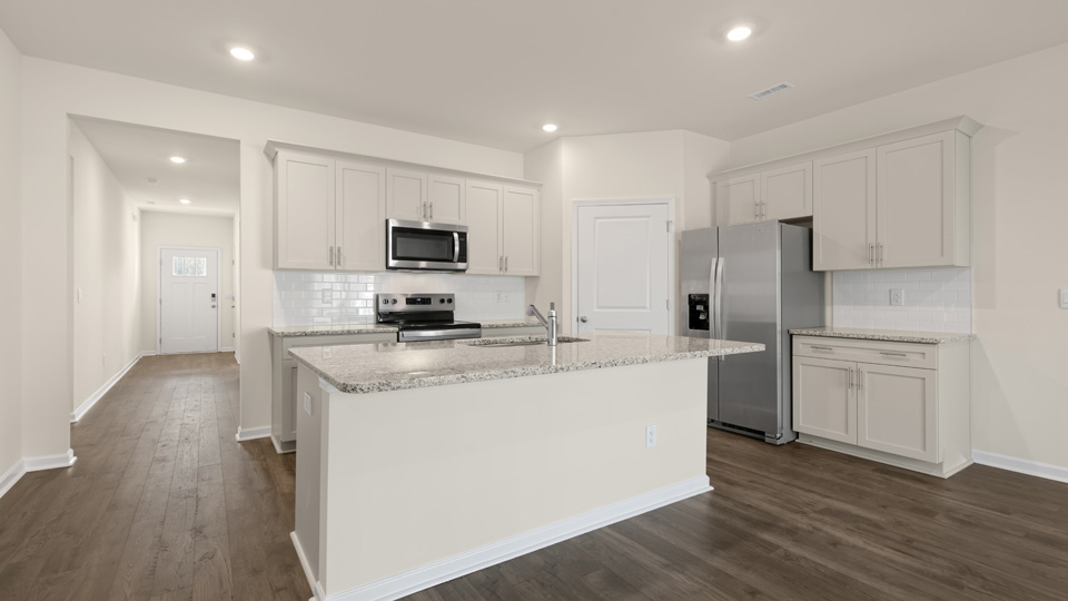 FRONT ENTRYWAY AND KITCHEN