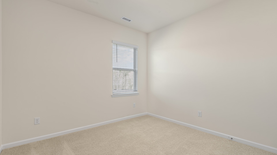 Bedroom with carpet flooring