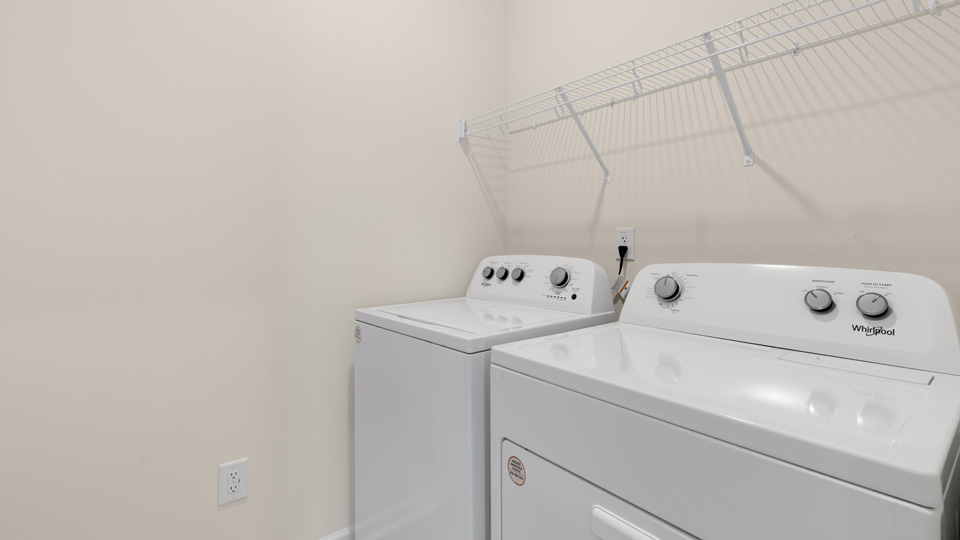 Laundry room with wire shelving