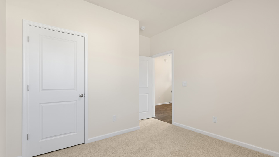 Bedroom with carpet flooring