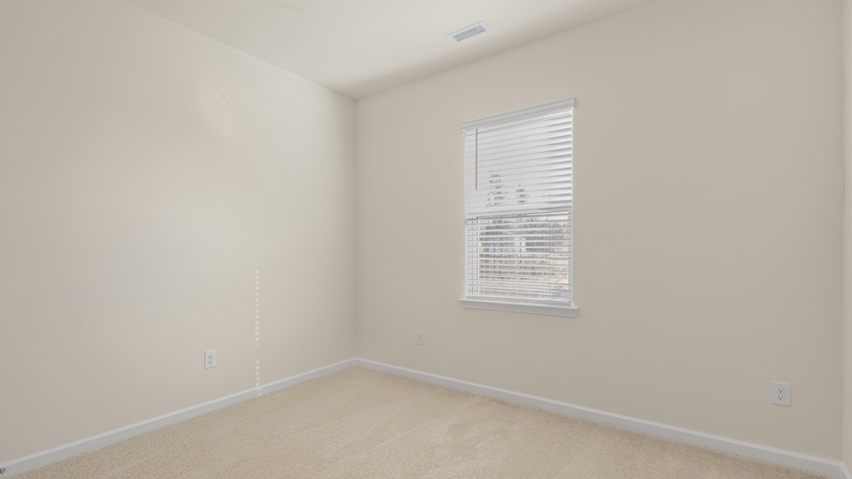 Bedroom with carpet flooring