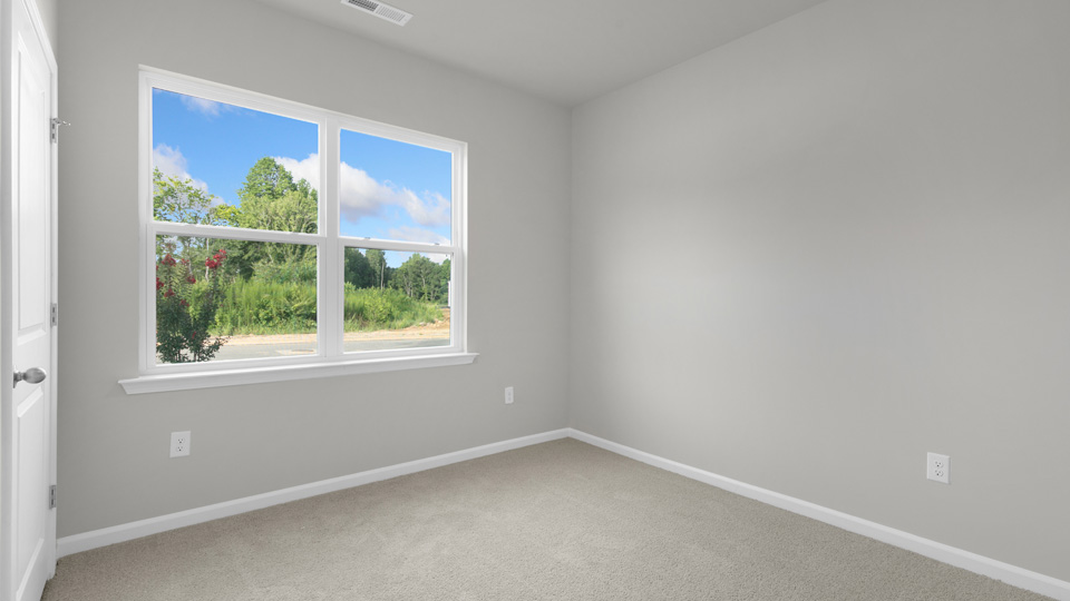 Bedroom with carpet