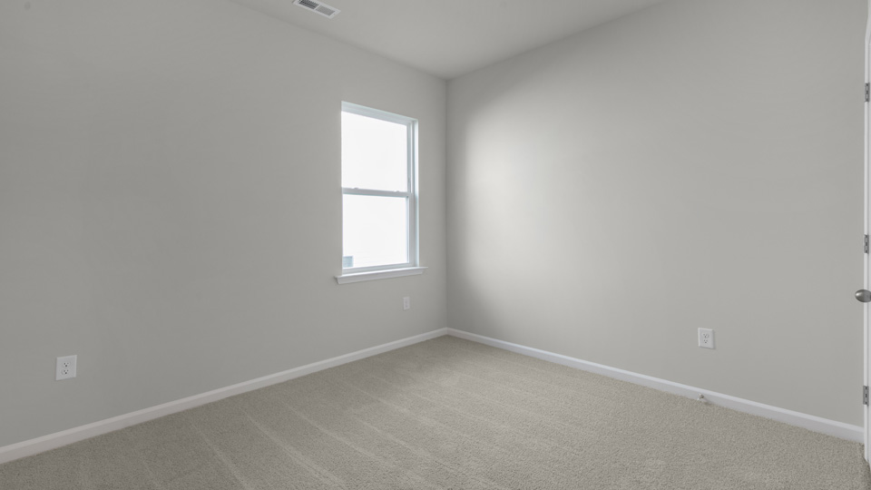 Bedroom with carpet