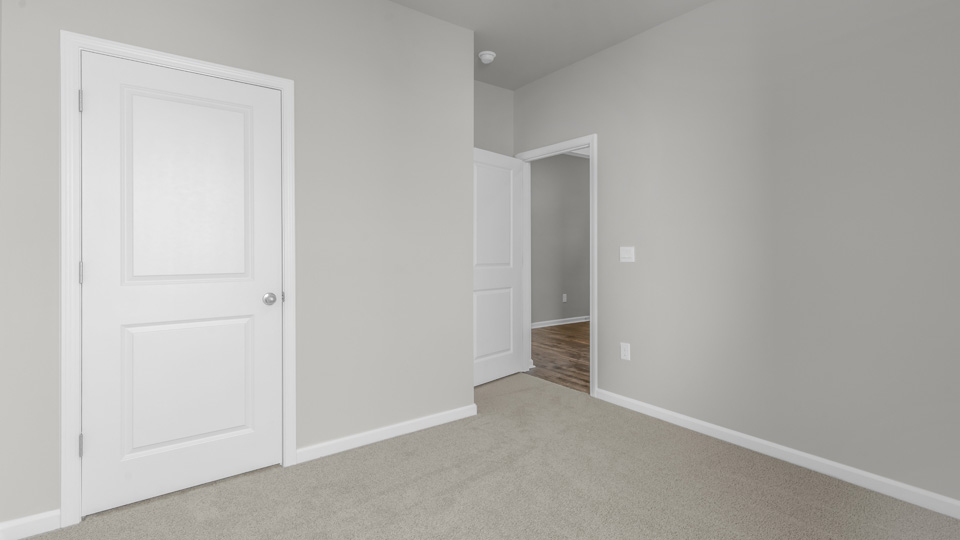 Bedroom with carpet