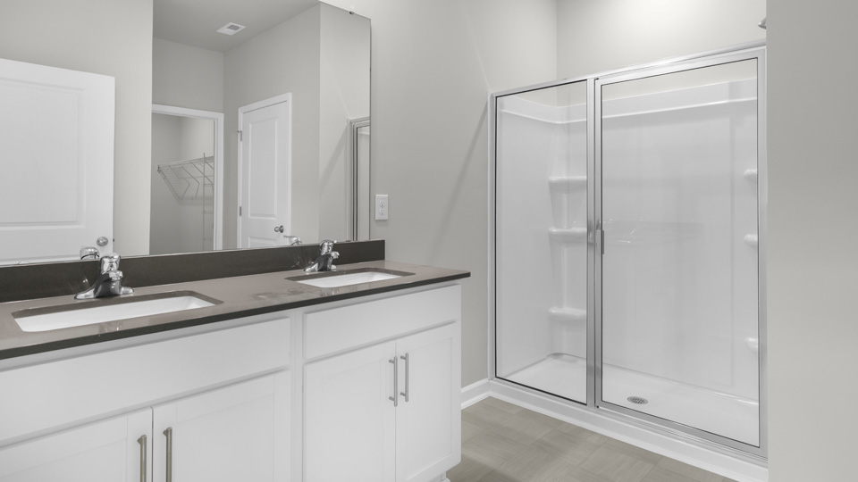 Bathroom with white cabinets