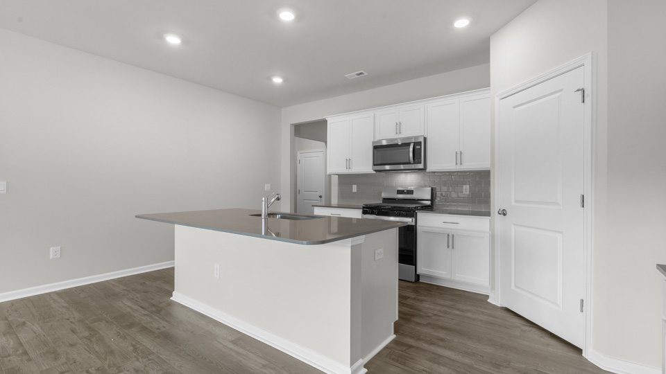 Kitchen with white cabinets