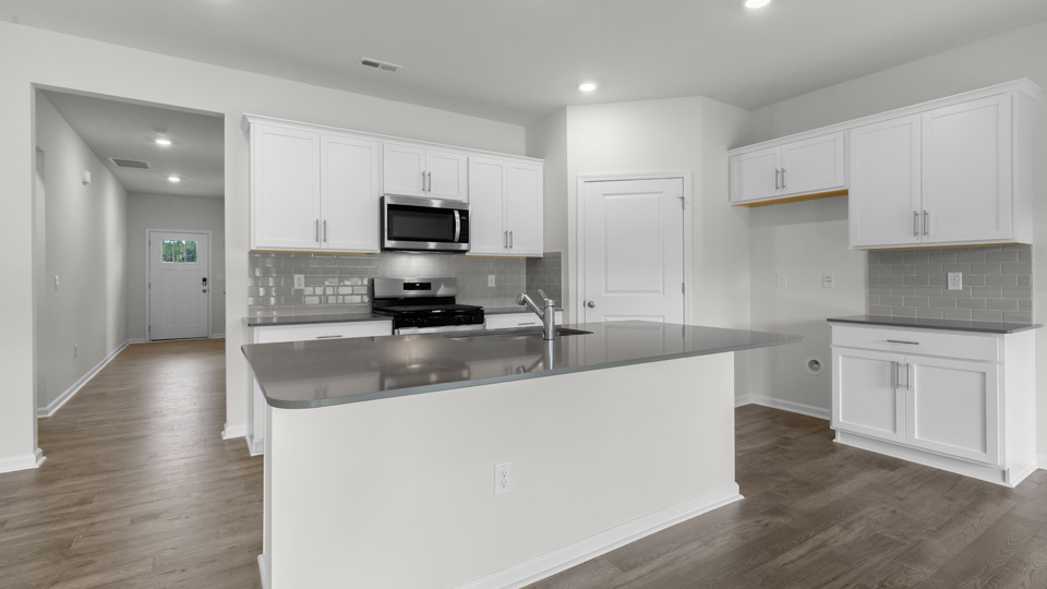 Kitchen with white cabinets