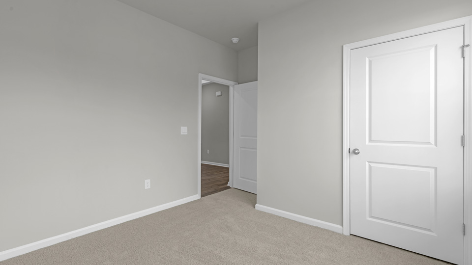 Bedroom with carpet