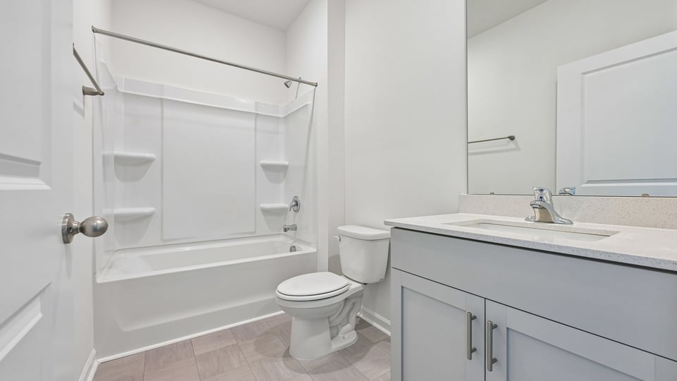bathroom with tub shower combo