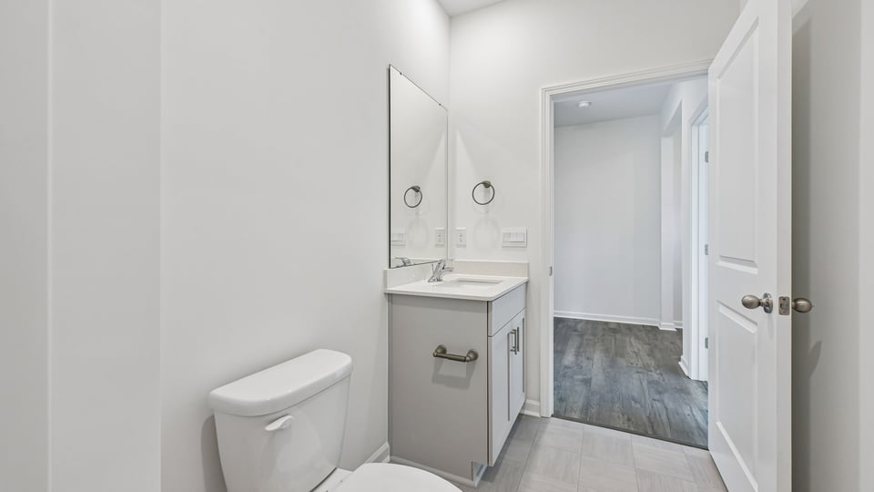 bathroom with quartz countertops