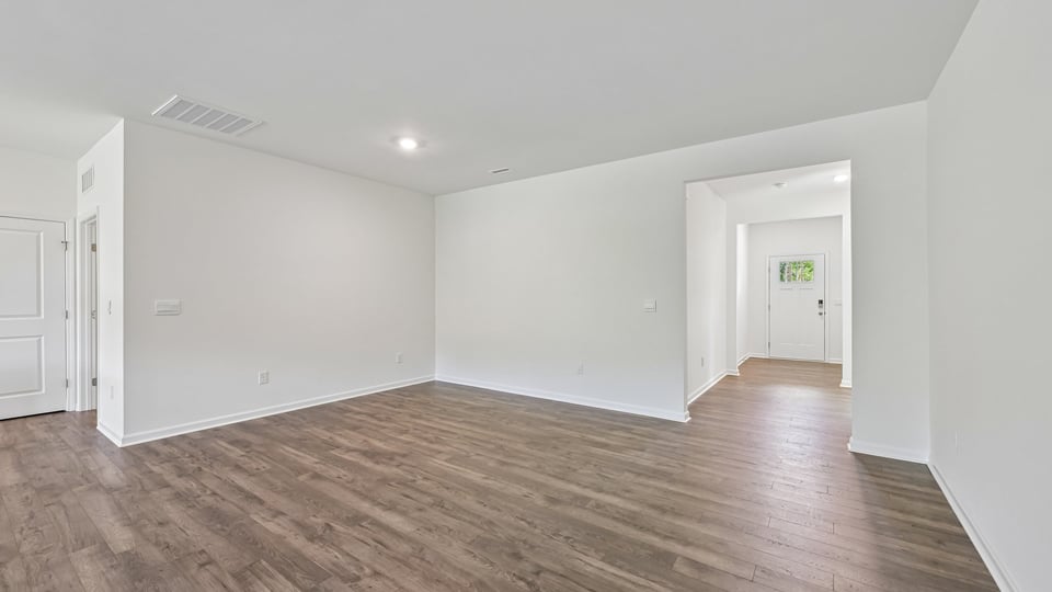 living room with revwood flooring