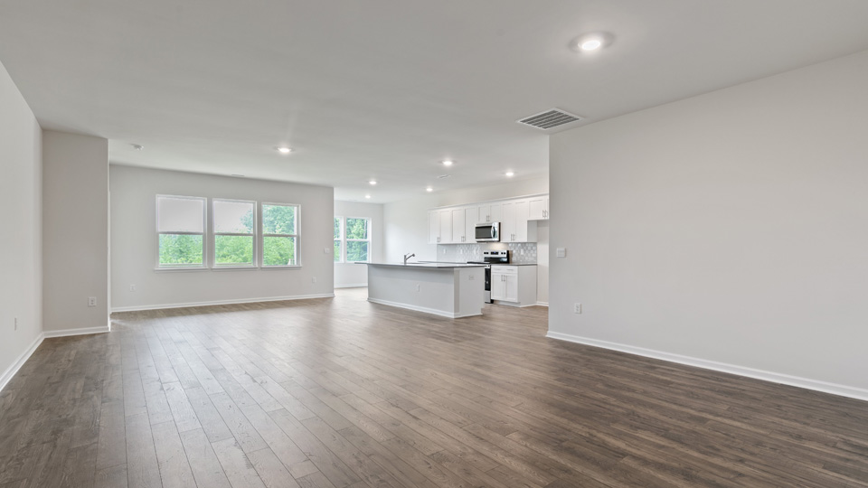 open concept living space with large windows