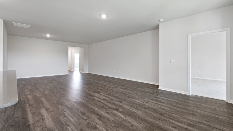 open concept living space with large windows