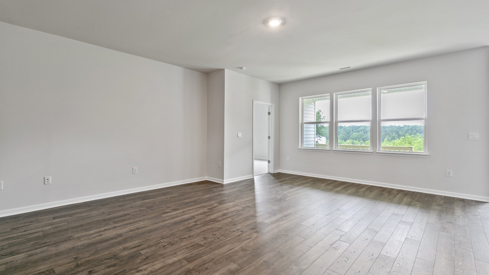open concept living space with large windows