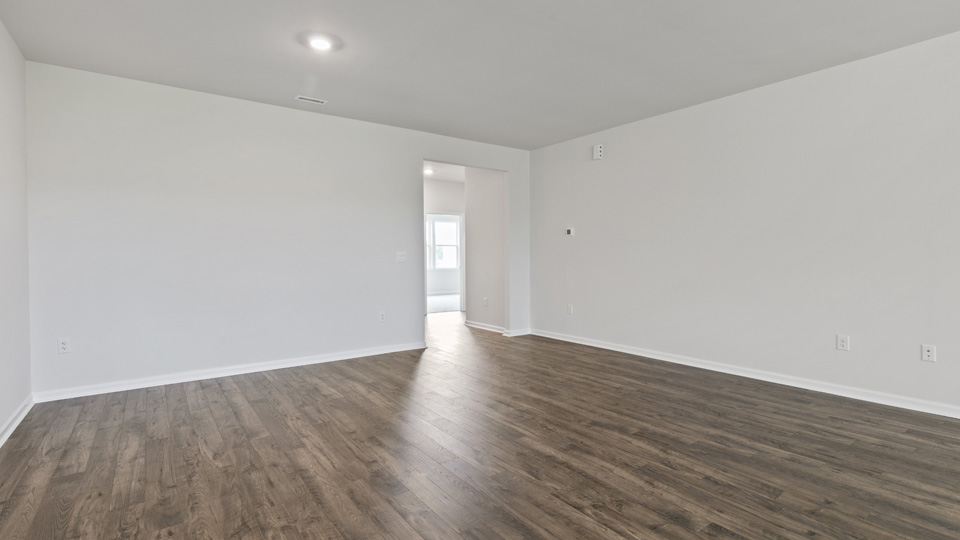 open concept living space with large windows