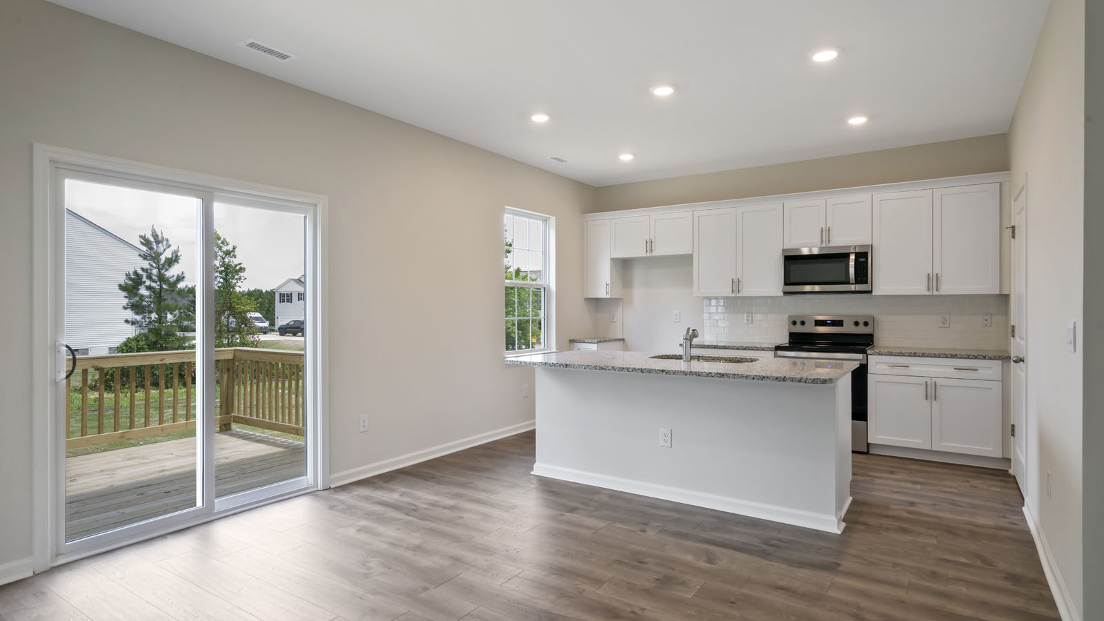 kitchen with sliding glass doors to back deck