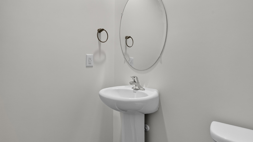 half bath with single pedestal sink