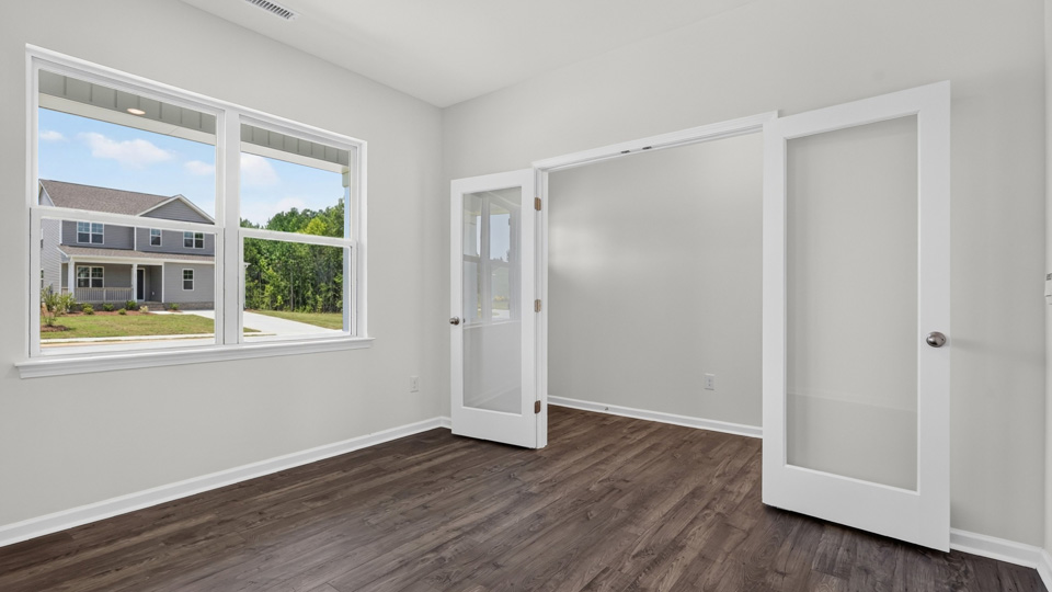 flex room with large windows, french doors