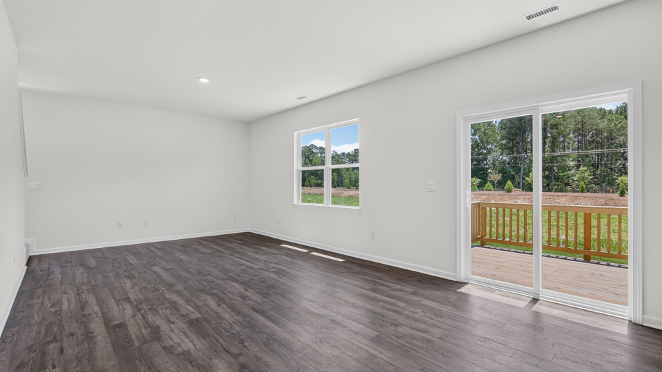 open concept living space with large windows