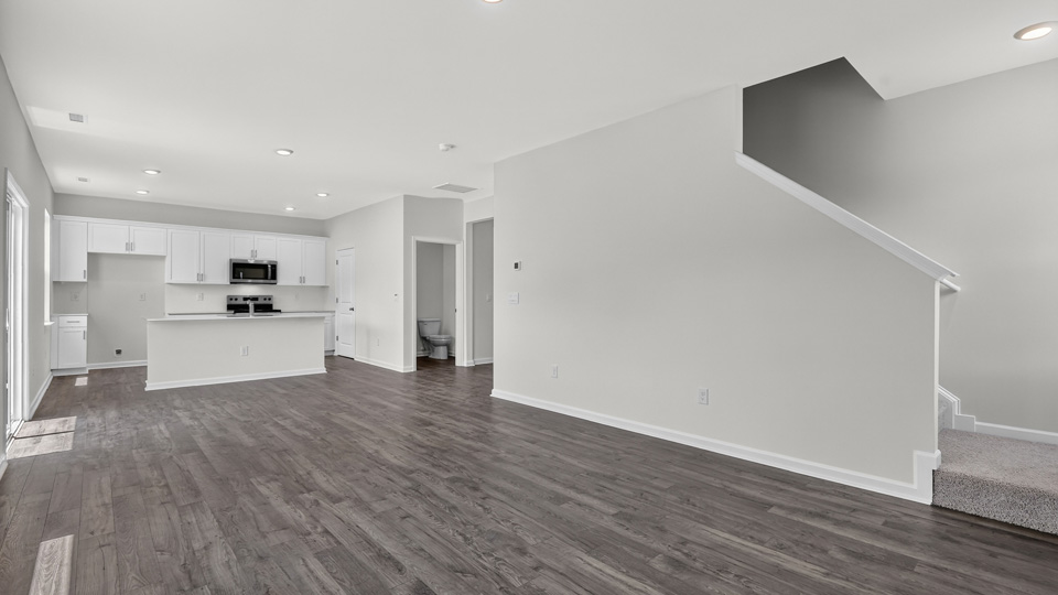 open concept living space with large windows