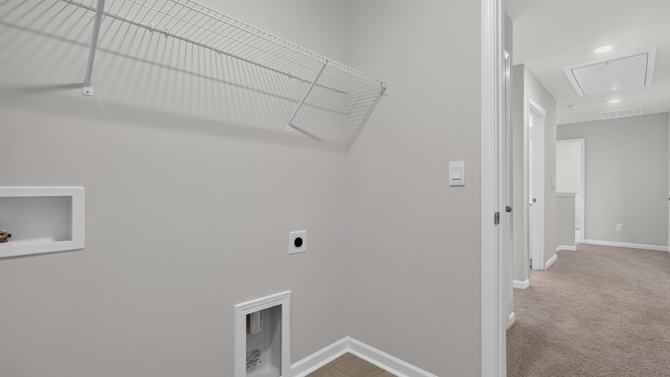 laundry room with wire shelving