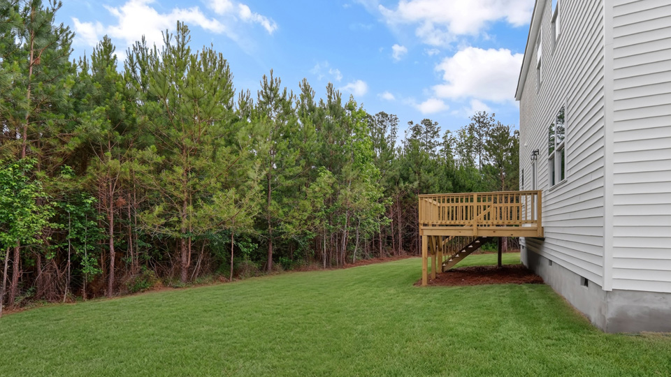 wooded back yard on large homesite