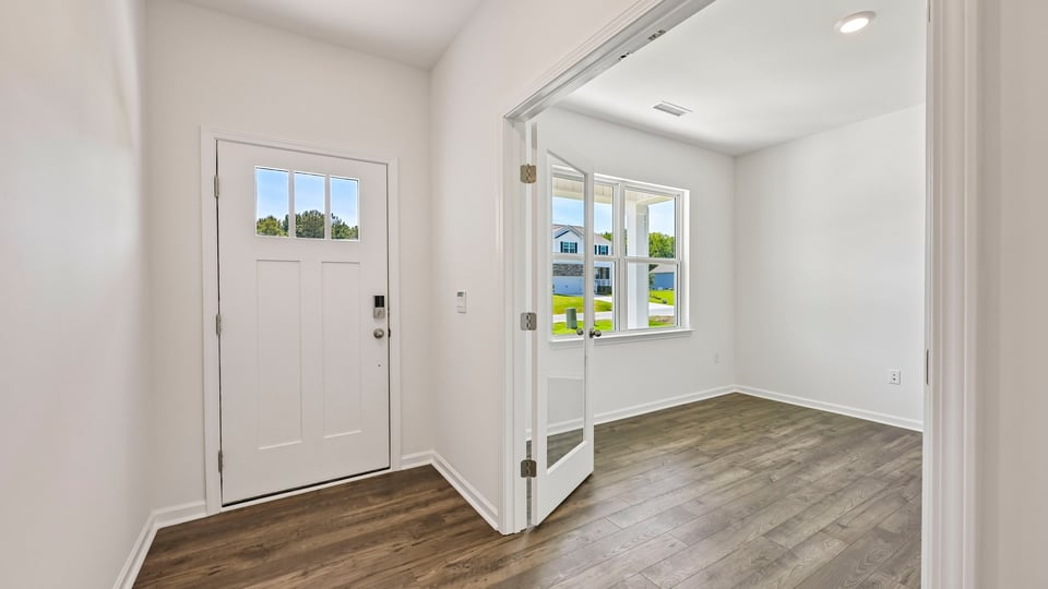 foyer entryway with revwood flooring