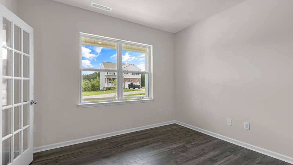 flex room with large windows, french doors