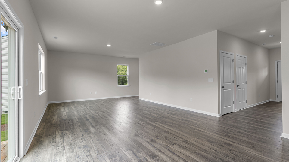 open concept living space with large windows