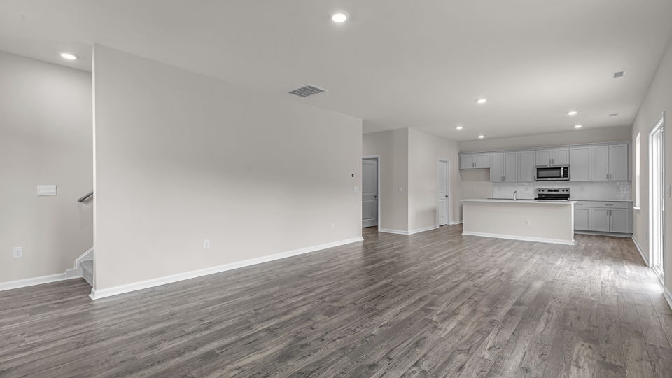 open concept living space with large windows
