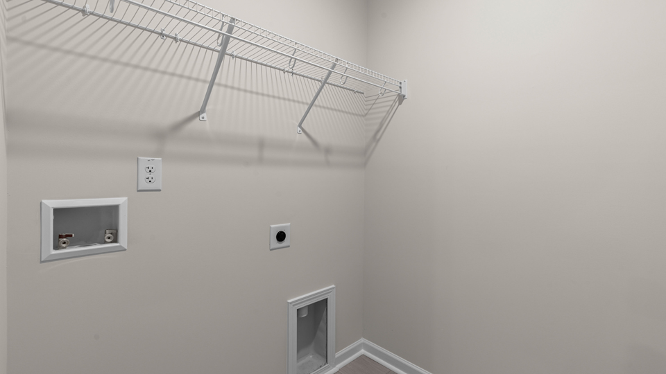 laundry room with wire shelving