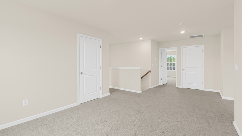 Loft with carpet flooring