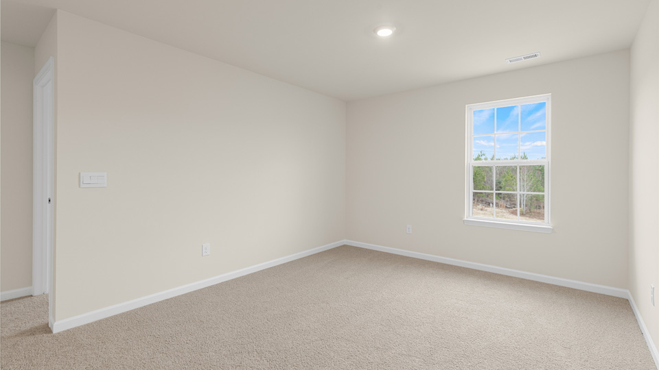 Loft with carpet flooring