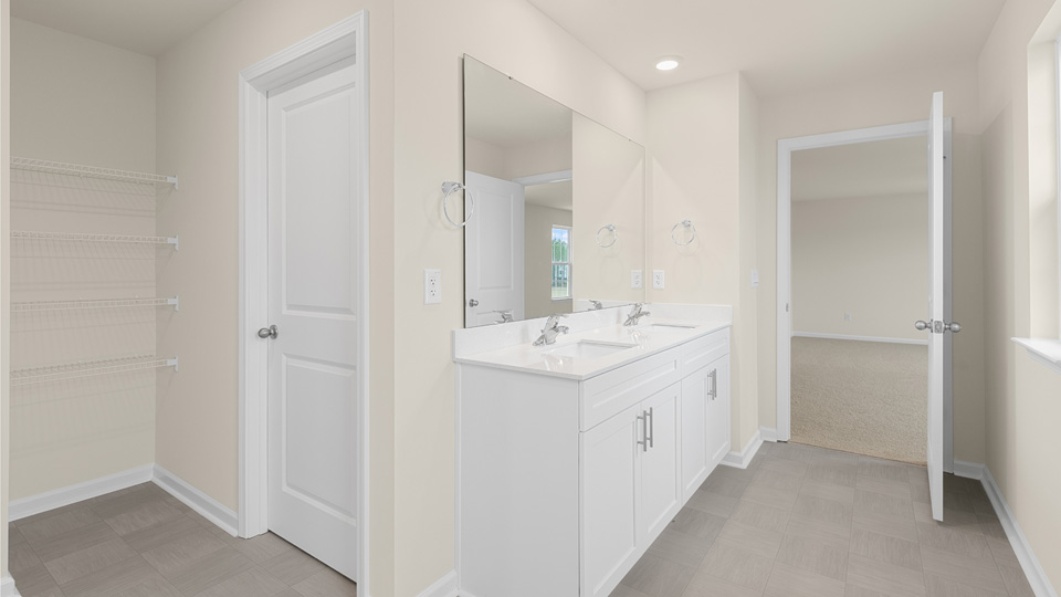 Primary bathroom with quartz counters