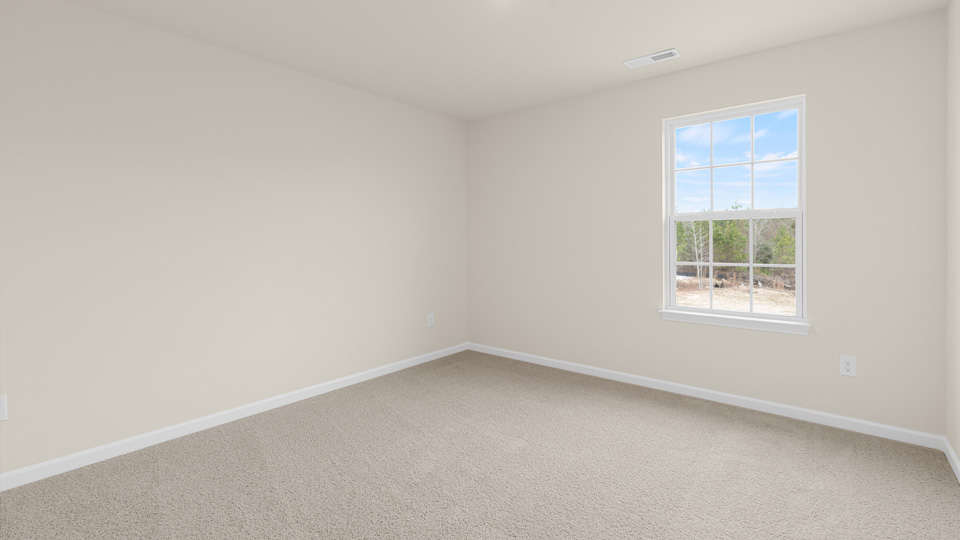 Bedroom with carpet flooring
