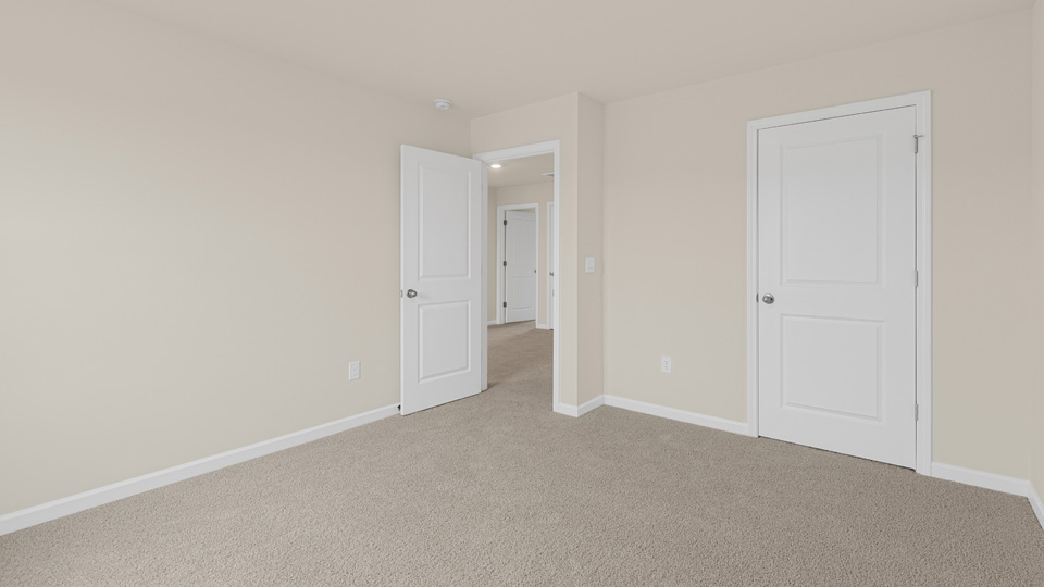 Bedroom with carpet flooring