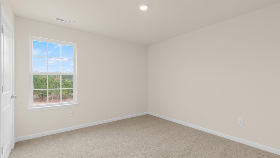 Bedroom with carpet flooring