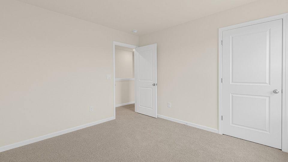 Bedroom with carpet flooring